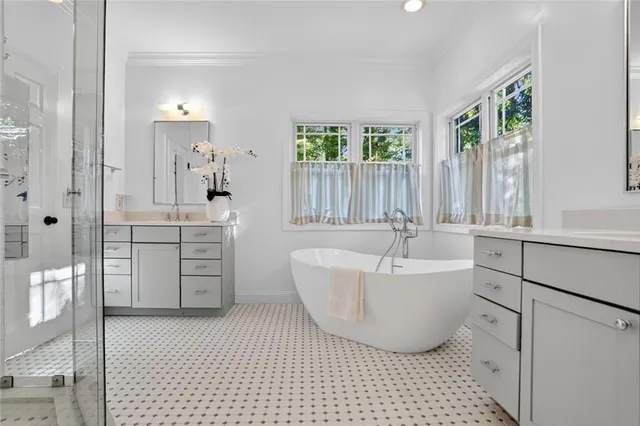 a living room with a couch and a window