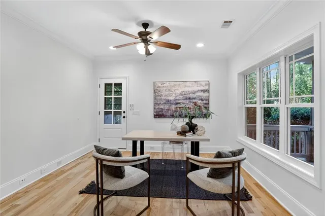 a workspace with furniture and window