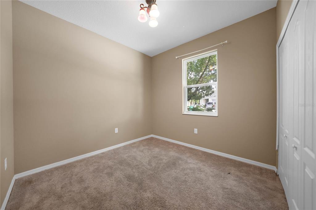 10147 Winding River Road Punta Gorda, FL 33950 - Photo 20 of 33 an empty room with windows and closet