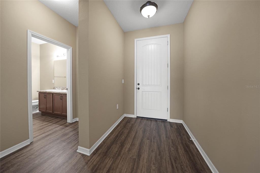 10147 Winding River Road Punta Gorda, FL 33950 - Photo 2 of 33 a view of a room with wooden floor