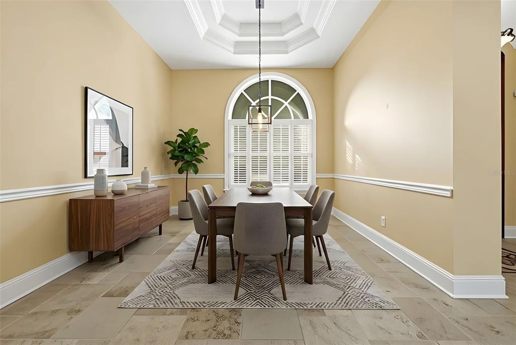 30248 Rainey Road Sorrento, FL 32776 - Photo 13 of 64 a view of a dining room with furniture window and wooden floor