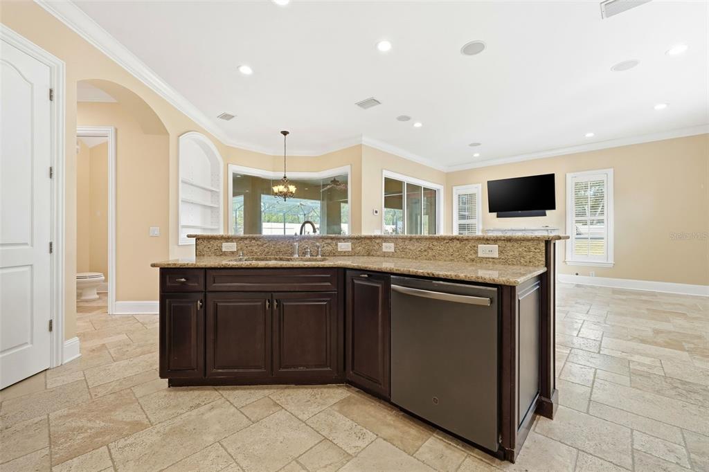 30248 Rainey Road Sorrento, FL 32776 - Photo 25 of 64 a bathroom with a granite countertop sink and a mirror
