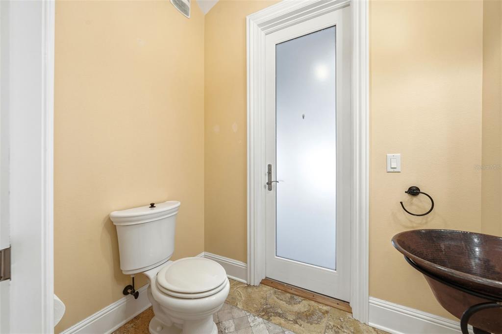 30248 Rainey Road Sorrento, FL 32776 - Photo 27 of 64 a bathroom with a sink and a toilet