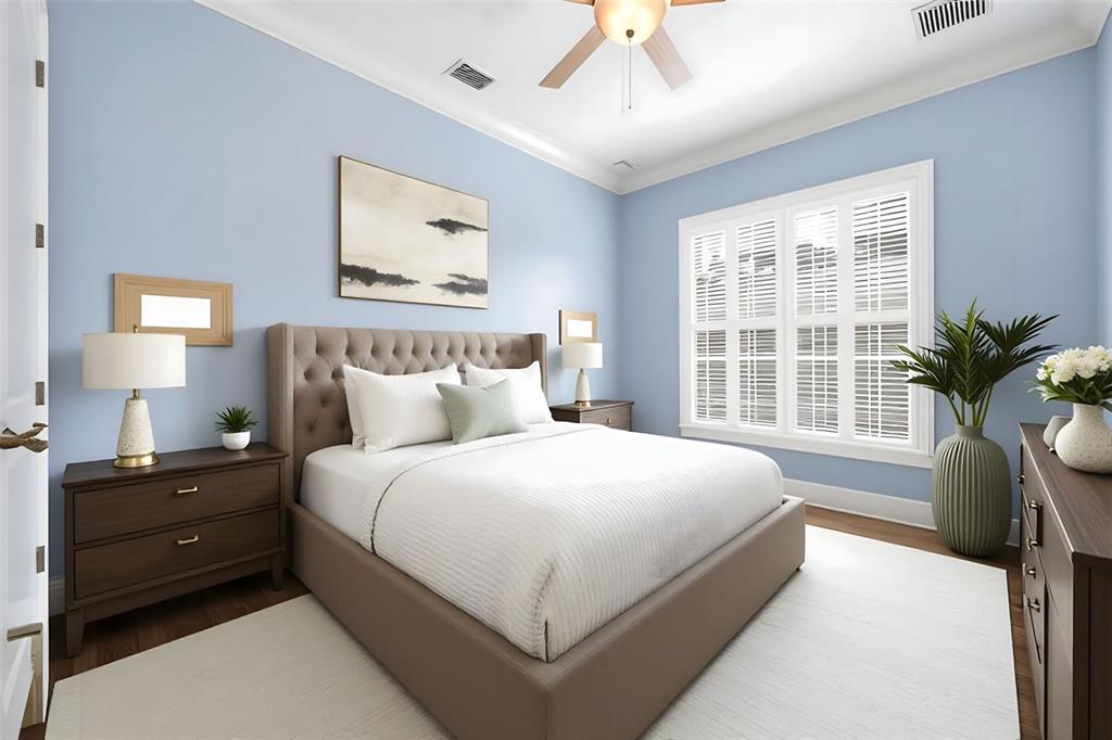 30248 Rainey Road Sorrento, FL 32776 - Photo 39 of 64 a spacious bedroom with a large bed and a window