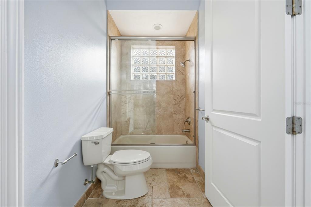 30248 Rainey Road Sorrento, FL 32776 - Photo 43 of 64 a bathroom with a toilet and a shower
