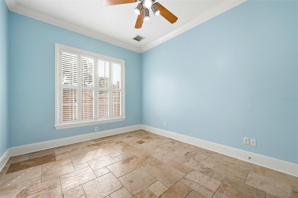 30248 Rainey Road Sorrento, FL 32776 - Photo 45 of 64 an empty room with chandelier fan and windows