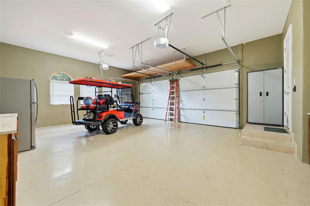 30248 Rainey Road Sorrento, FL 32776 - Photo 54 of 64 a view of a garage with furniture