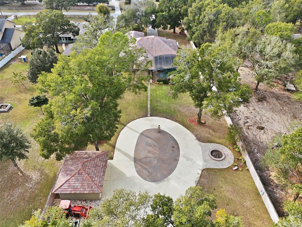 30248 Rainey Road Sorrento, FL 32776 - Photo 61 of 64 an aerial view of a house with a yard and garden
