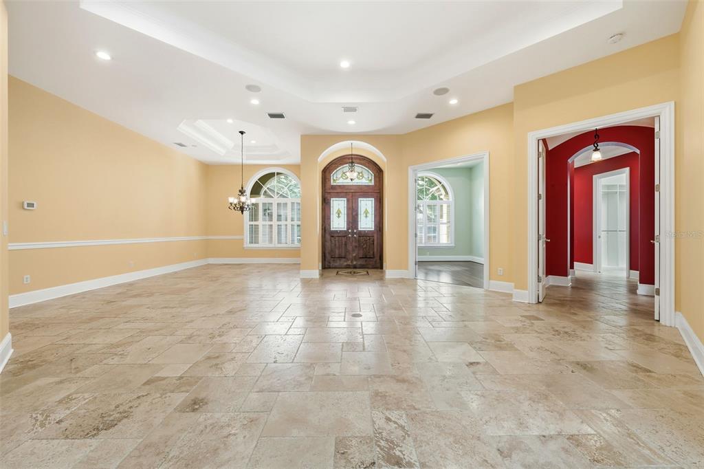 30248 Rainey Road Sorrento, FL 32776 - Photo 10 of 64 a view of a hallway with wooden floor and windows