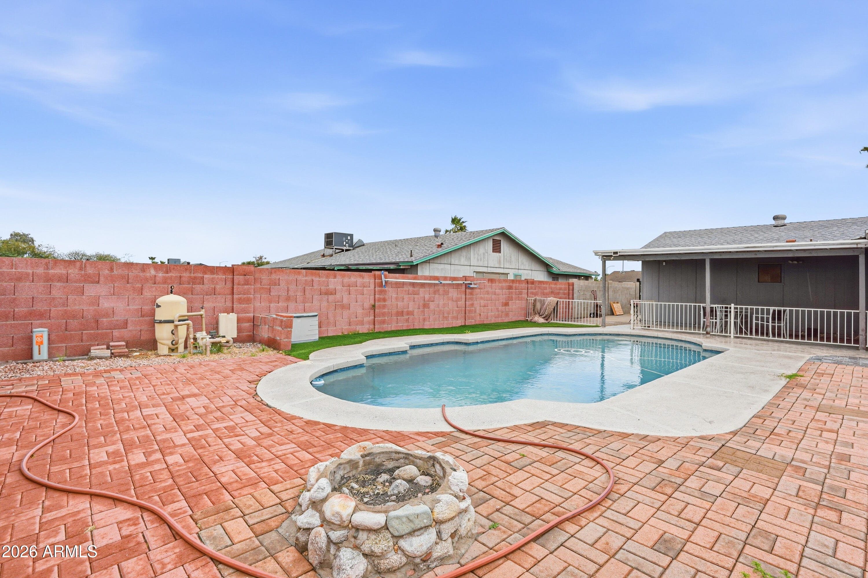 7233 West Hatcher Road Peoria, AZ 85345 - Photo 33 of 36 a view of a house with swimming pool