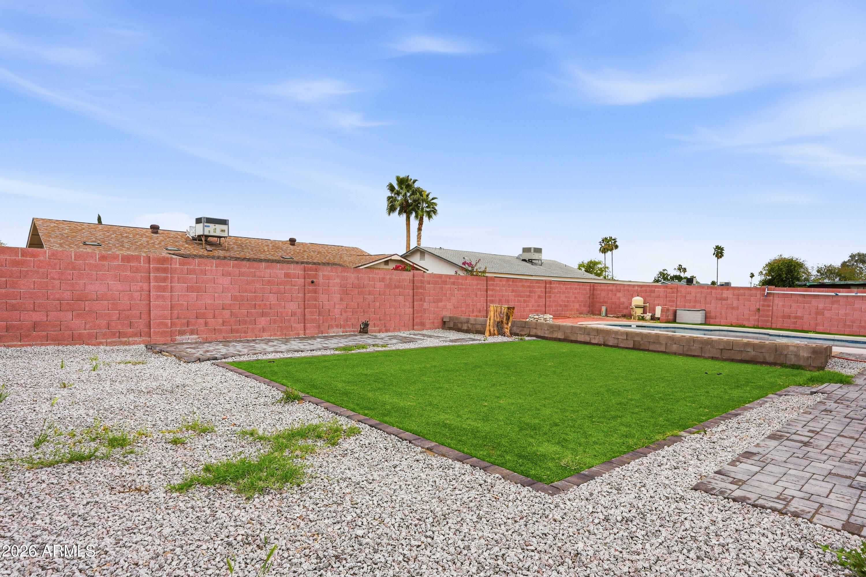 7233 West Hatcher Road Peoria, AZ 85345 - Photo 35 of 36 a view of a backyard