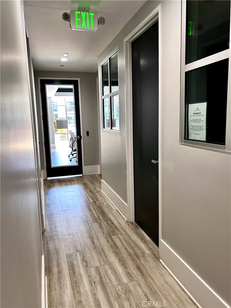 1326 Scholarship Irvine, CA 92612 - Photo 25 of 27 en empty room with window and wooden floor