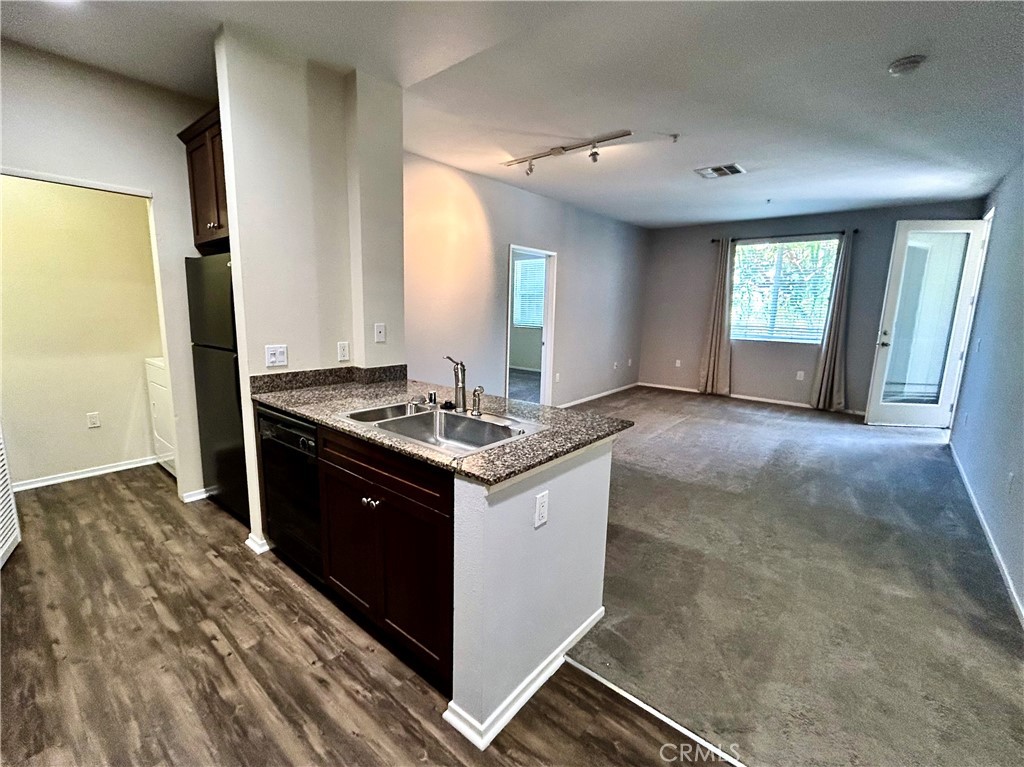 1326 Scholarship Irvine, CA 92612 - Photo 3 of 27 a kitchen with a sink and cabinets