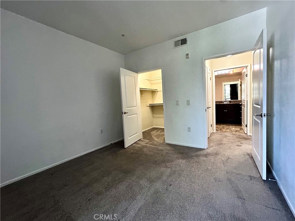1326 Scholarship Irvine, CA 92612 - Photo 7 of 27 an empty room with closet and a bathroom