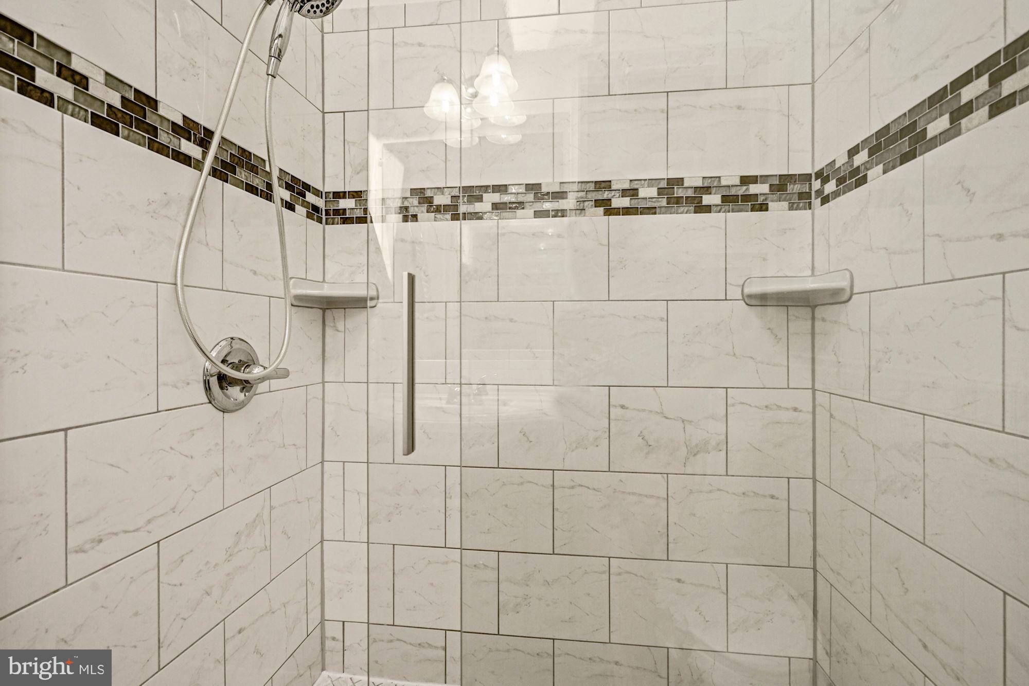 832 5th Street Northeast Washington, DC 20002 - Photo 19 of 35 a bathroom with a shower
