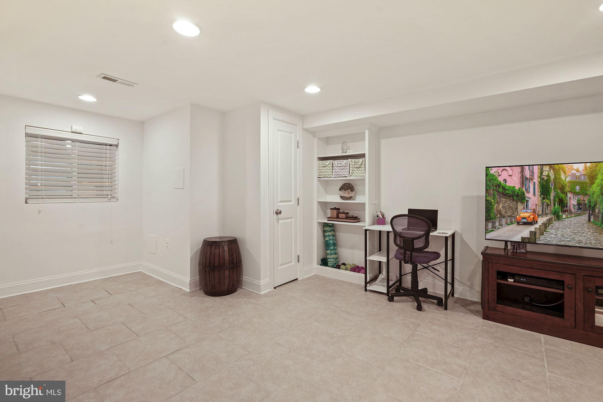 832 5th Street Northeast Washington, DC 20002 - Photo 27 of 35 a room with furniture and a piano