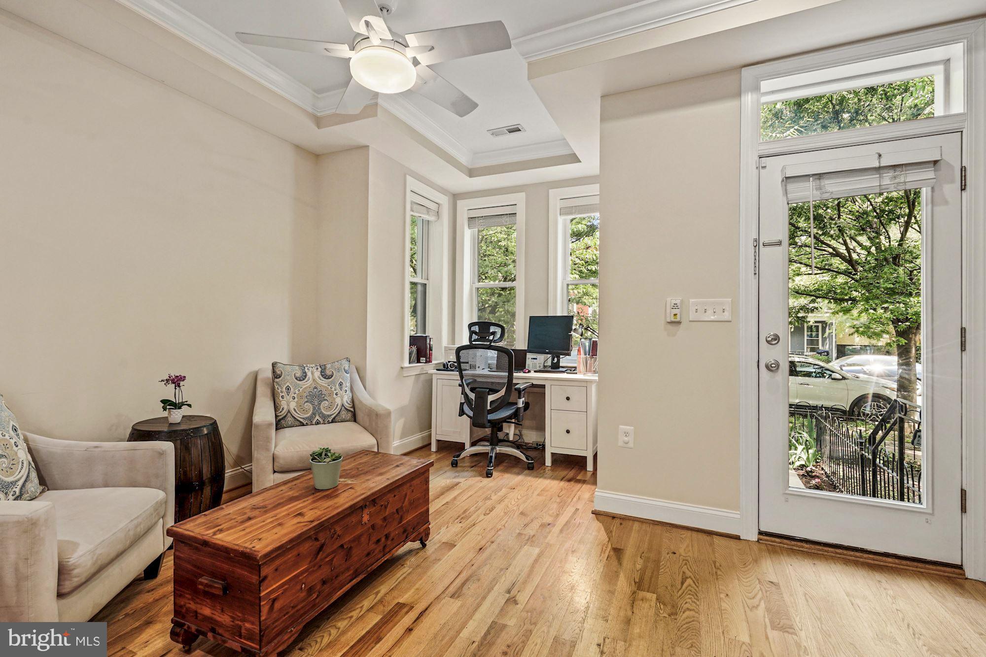 832 5th Street Northeast Washington, DC 20002 - Photo 4 of 35 a living room with furniture and a window