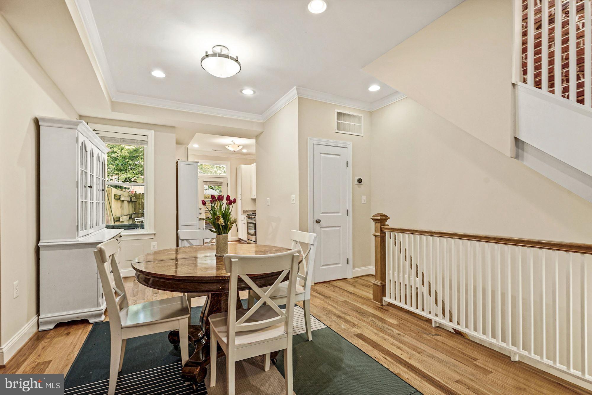 832 5th Street Northeast Washington, DC 20002 - Photo 5 of 35 a dining room with furniture and window
