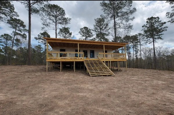 a view of a chairs setting on the deck