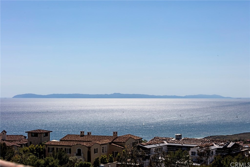 3 Midsummer Newport Coast, CA 92657 - Photo 2 of 2 a view of ocean with large building and trees in the background