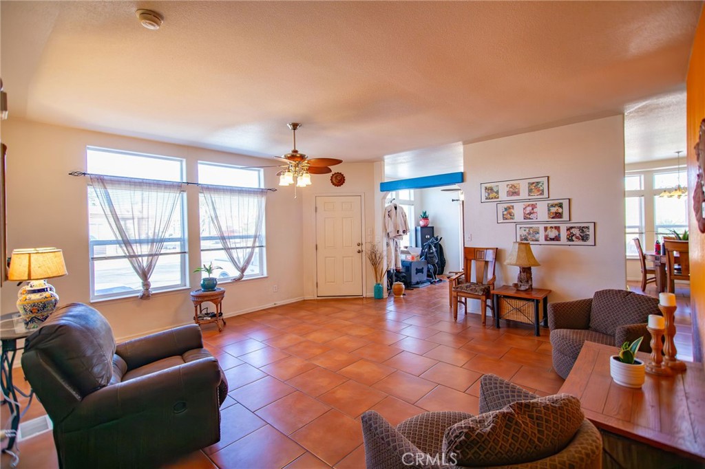 1106 Beach Drive Needles, CA 92363 - Photo 17 of 73 a living room with furniture and a large window