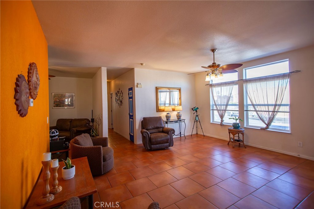 1106 Beach Drive Needles, CA 92363 - Photo 18 of 73 a living room with furniture and a large window