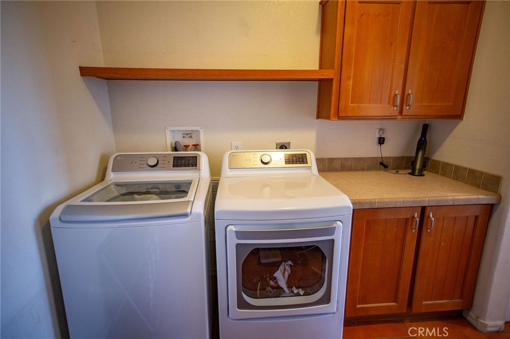 1106 Beach Drive Needles, CA 92363 - Photo 39 of 73 a utility room with dryer and washer