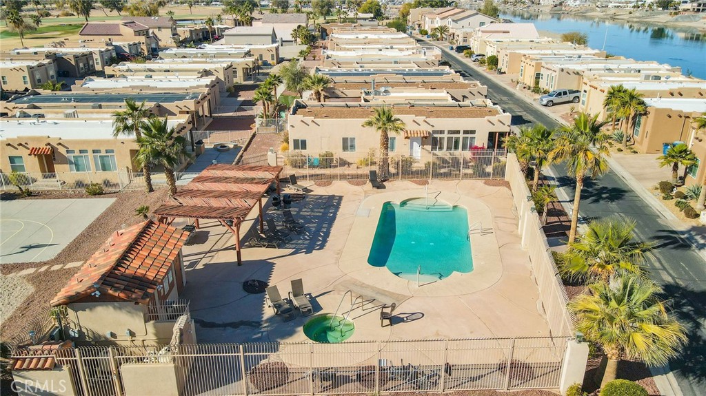 1106 Beach Drive Needles, CA 92363 - Photo 58 of 73 an aerial view of a swimming pool with outdoor seating