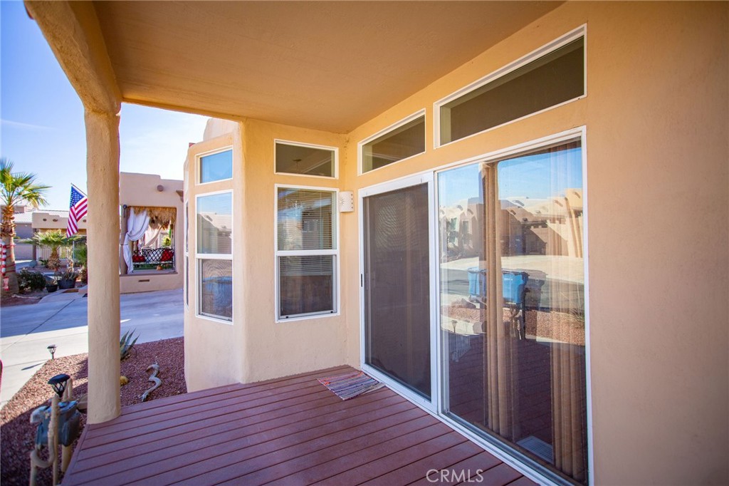 1106 Beach Drive Needles, CA 92363 - Photo 7 of 73 a view of an entryway with wooden floor and door