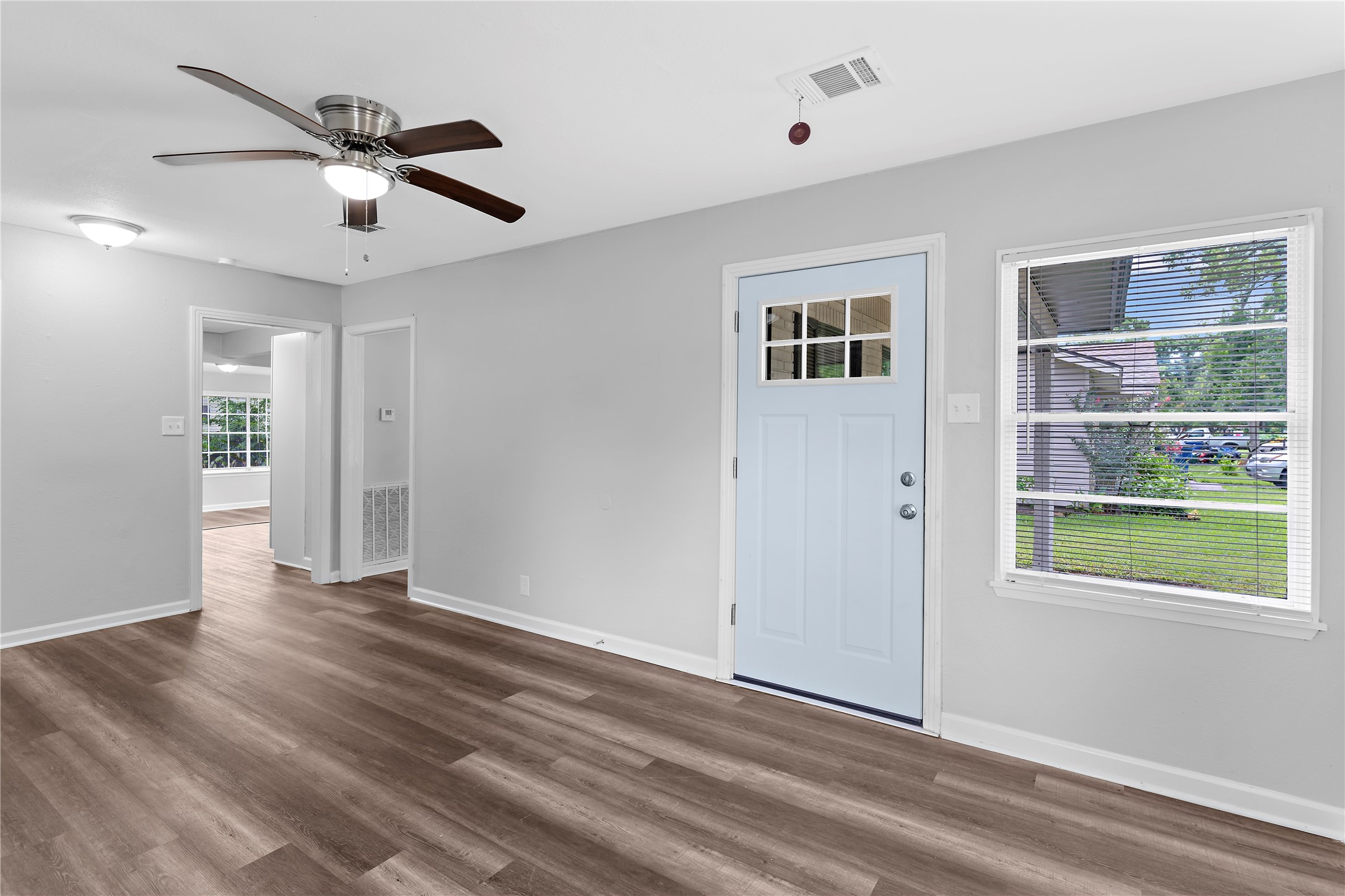 1104 Southampton Drive Angleton, TX 77515 - Photo 3 of 26 a view of an empty room with a window