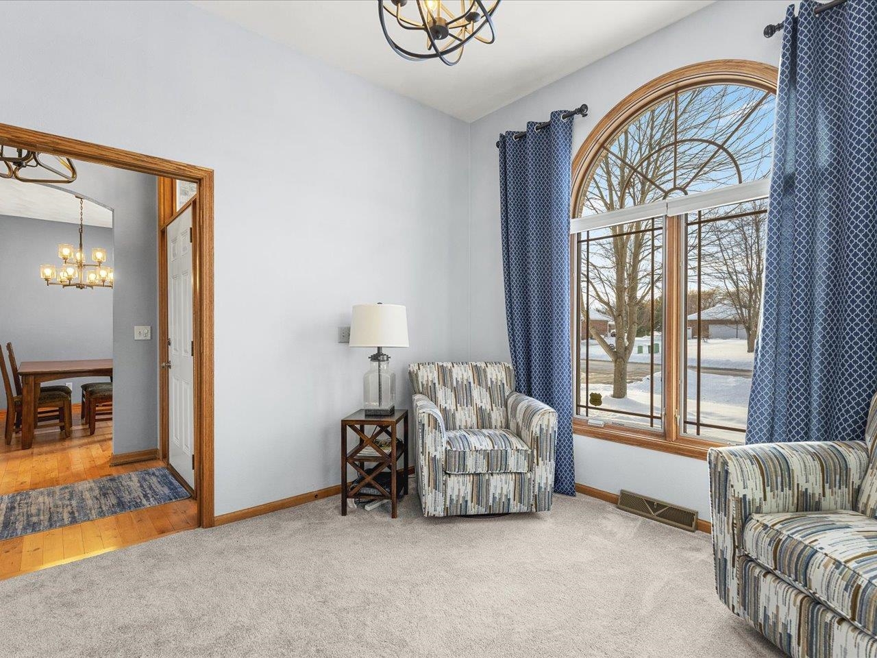 12375 Wildflower Lane Belvidere, IL 61008 - Photo 11 of 52 a living room with furniture and a large window