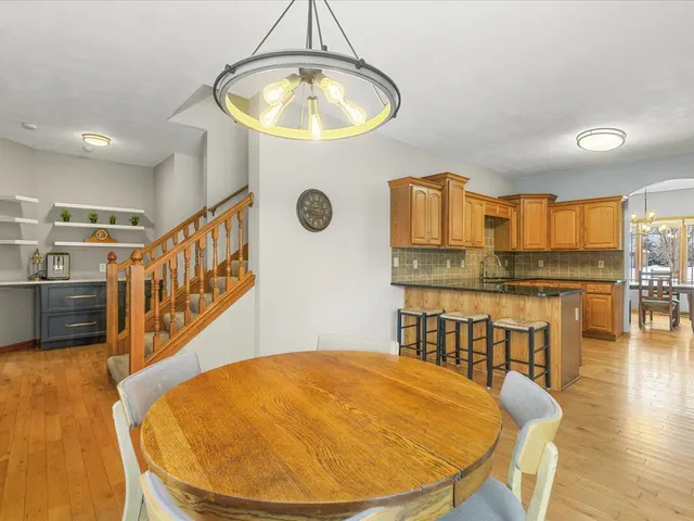 a indoor swimming pool with a seating space