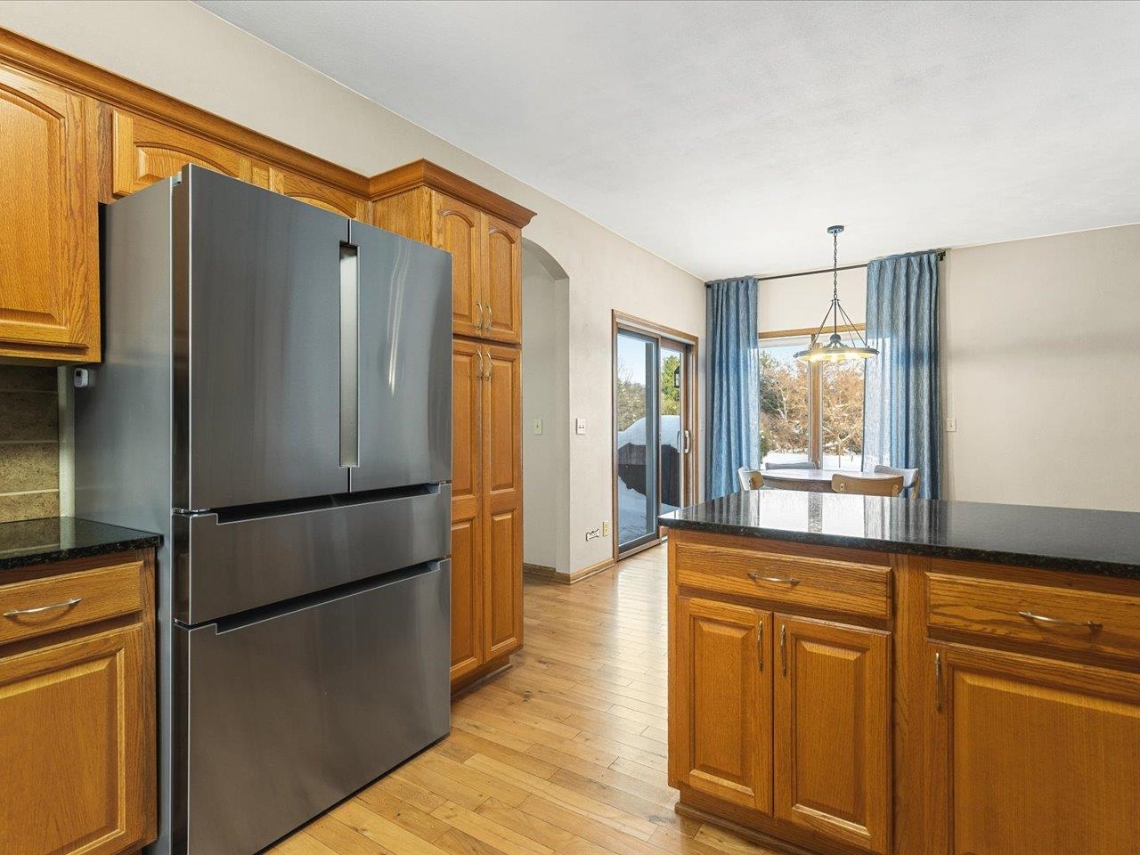 12375 Wildflower Lane Belvidere, IL 61008 - Photo 18 of 52 a kitchen with stainless steel appliances a refrigerator sink and cabinets