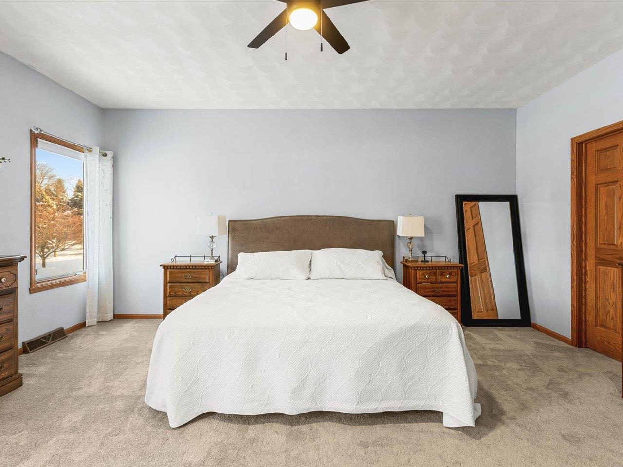 12375 Wildflower Lane Belvidere, IL 61008 - Photo 22 of 52 a bedroom with a bed and walk in closet