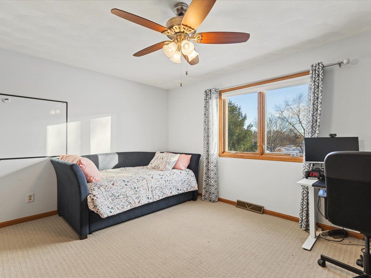 12375 Wildflower Lane Belvidere, IL 61008 - Photo 33 of 52 a bedroom with a bed and a window
