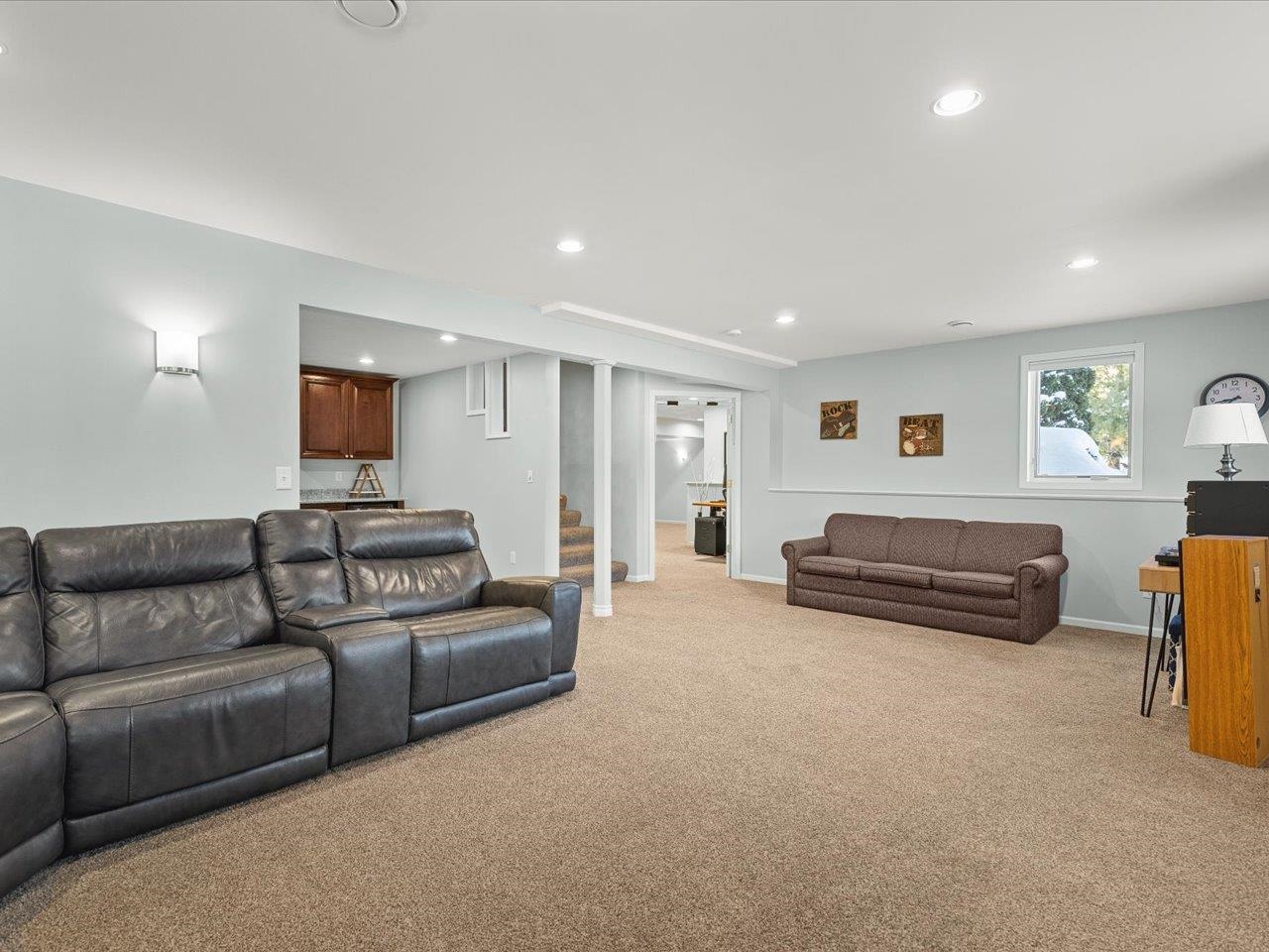 12375 Wildflower Lane Belvidere, IL 61008 - Photo 36 of 52 a living room with furniture and a window