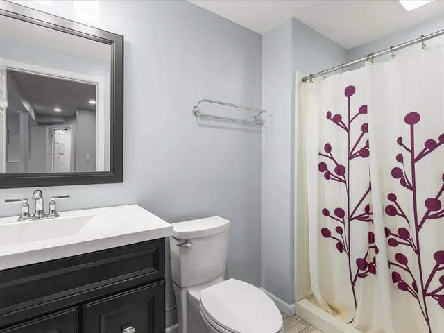 a bathroom with a sink and toilet