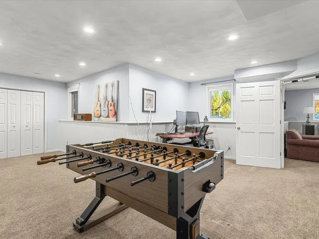 a living room with furniture and a table