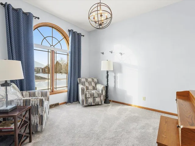 a view of room with furniture and window