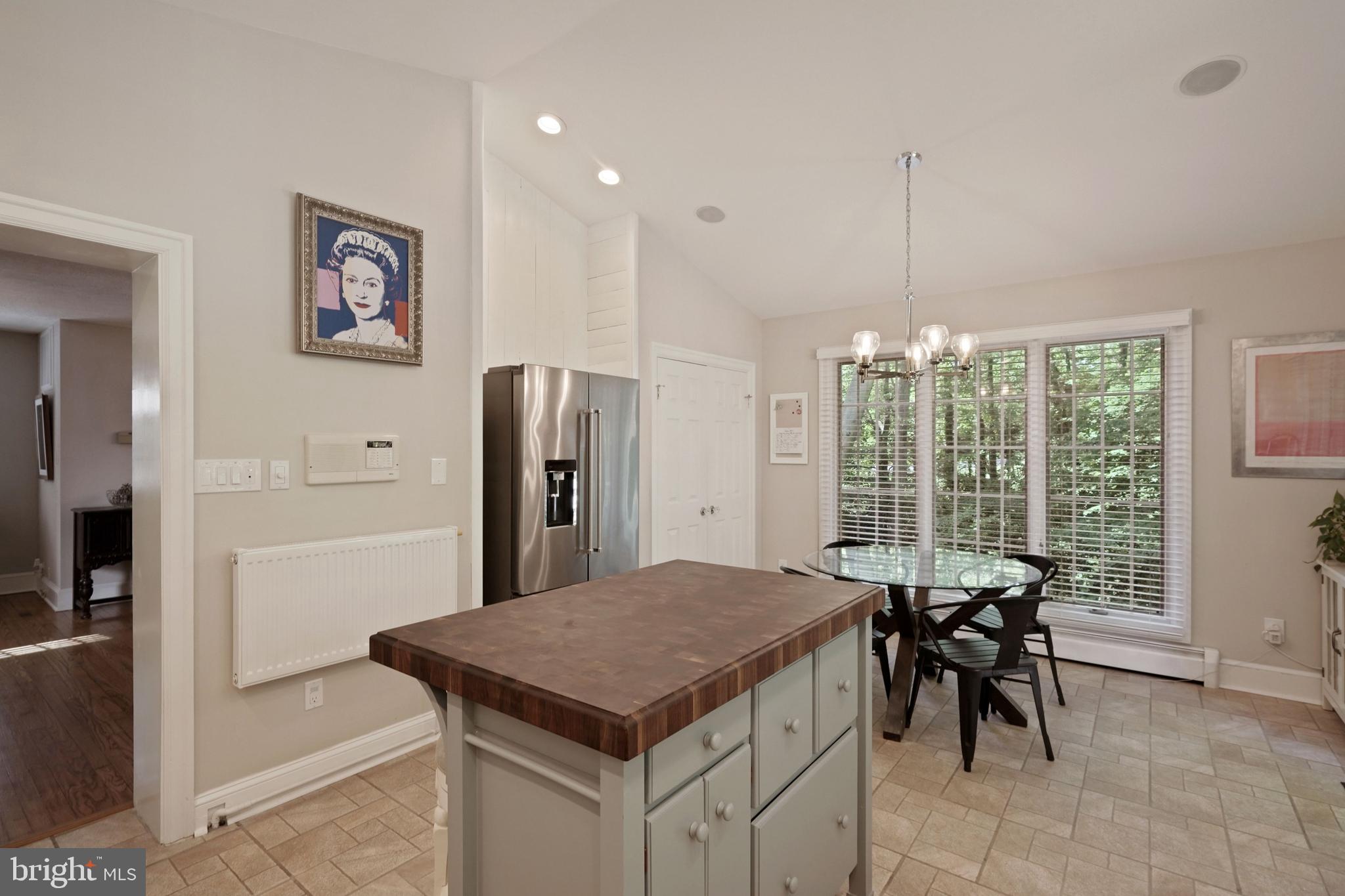 6580 Braddock Road Alexandria, VA 22312 - Photo 20 of 50 Walnut butcher block island, gas range&wine fridge