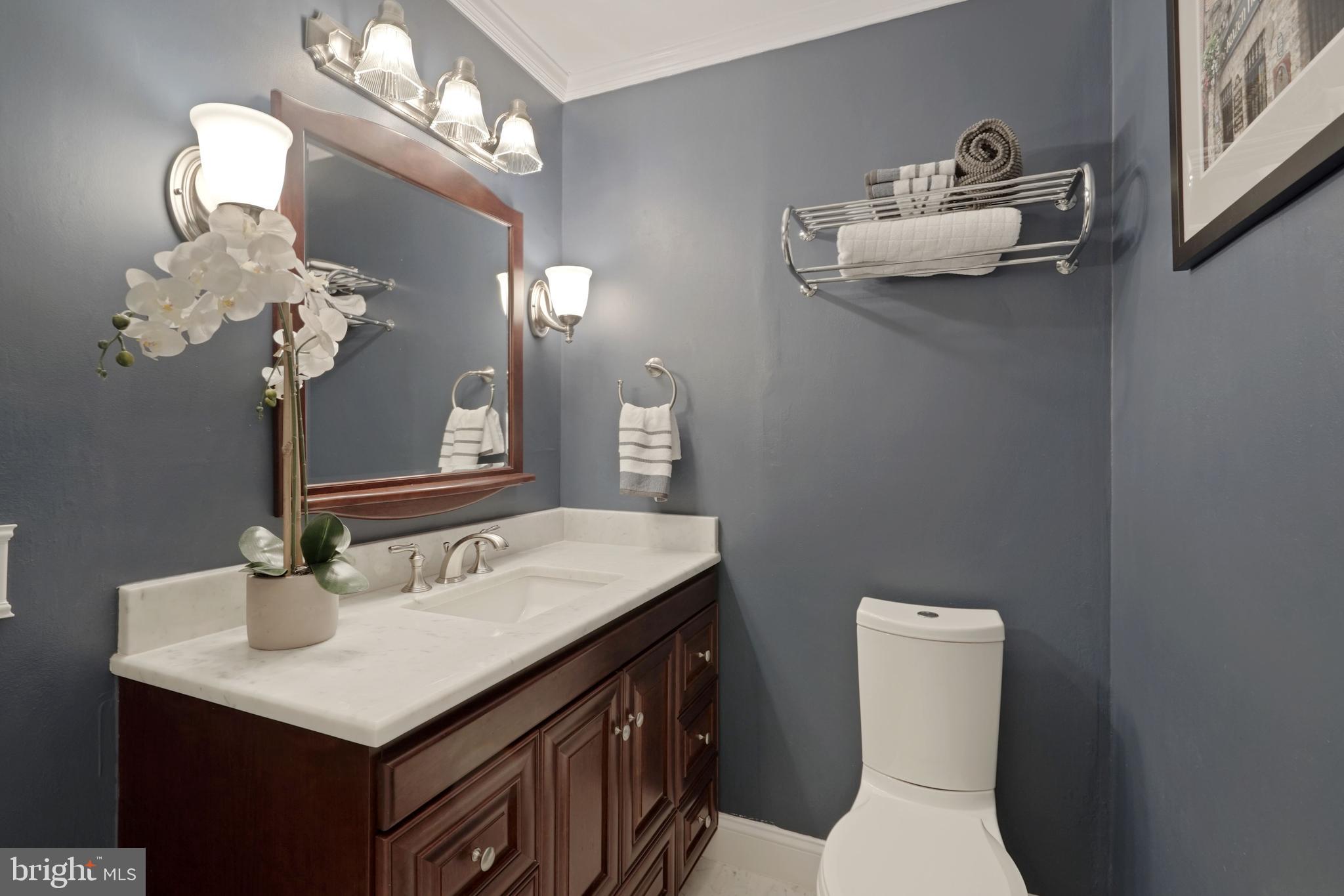 6580 Braddock Road Alexandria, VA 22312 - Photo 26 of 50 Essential 1rst floor bathroom w/marble throughout.