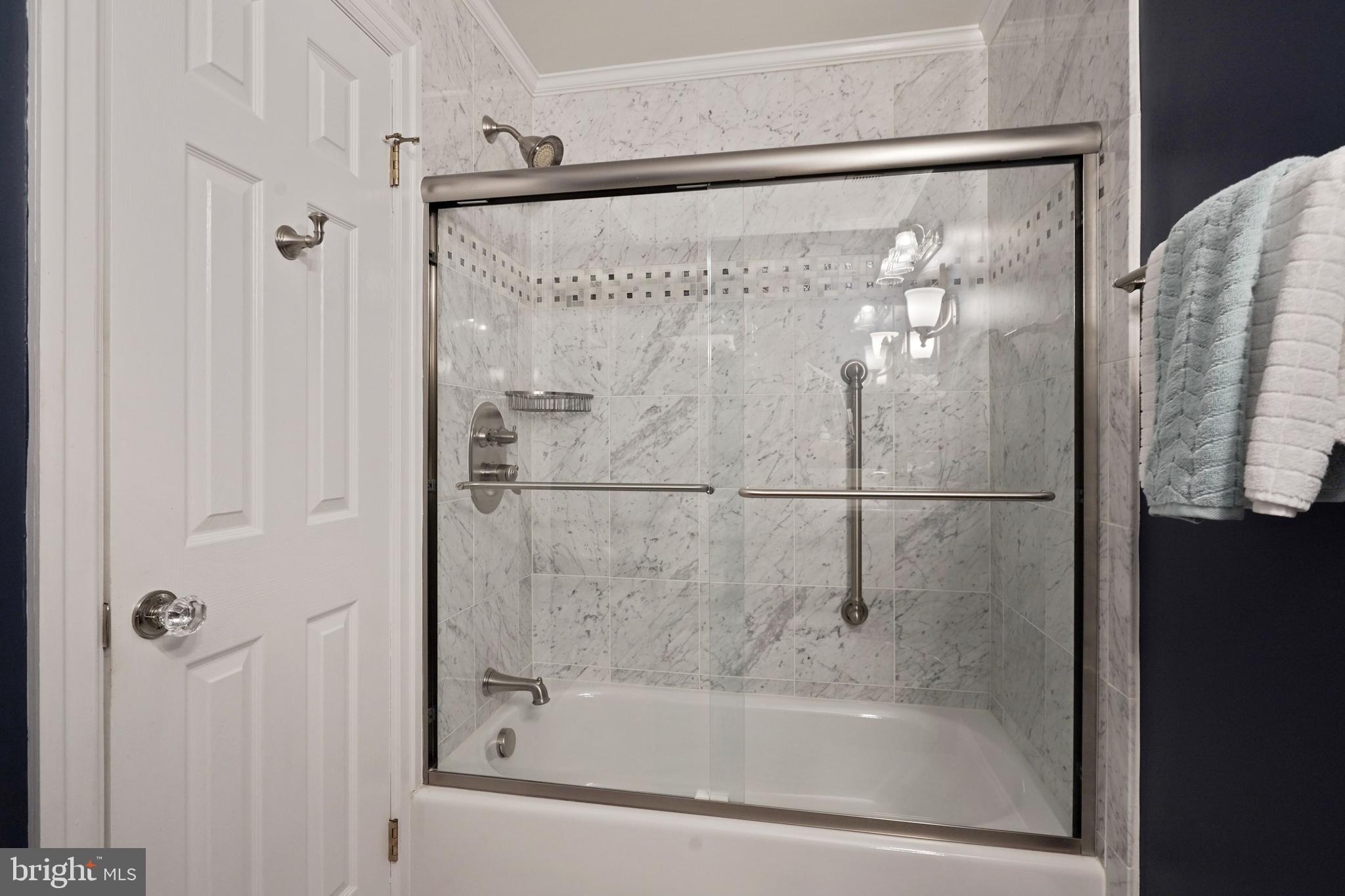 6580 Braddock Road Alexandria, VA 22312 - Photo 27 of 50 First floor bath with glass tub and shower