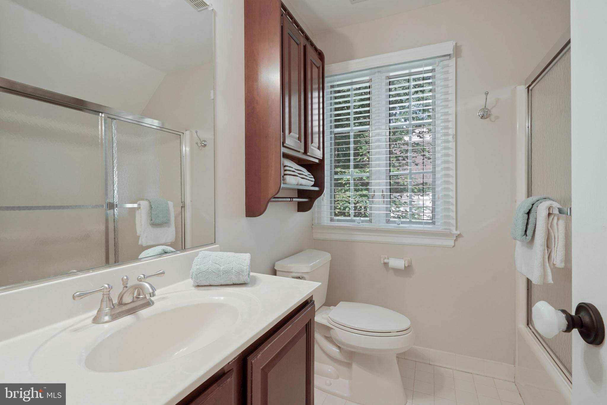 6580 Braddock Road Alexandria, VA 22312 - Photo 46 of 50 In-law suite bathroom with glass shower/tub