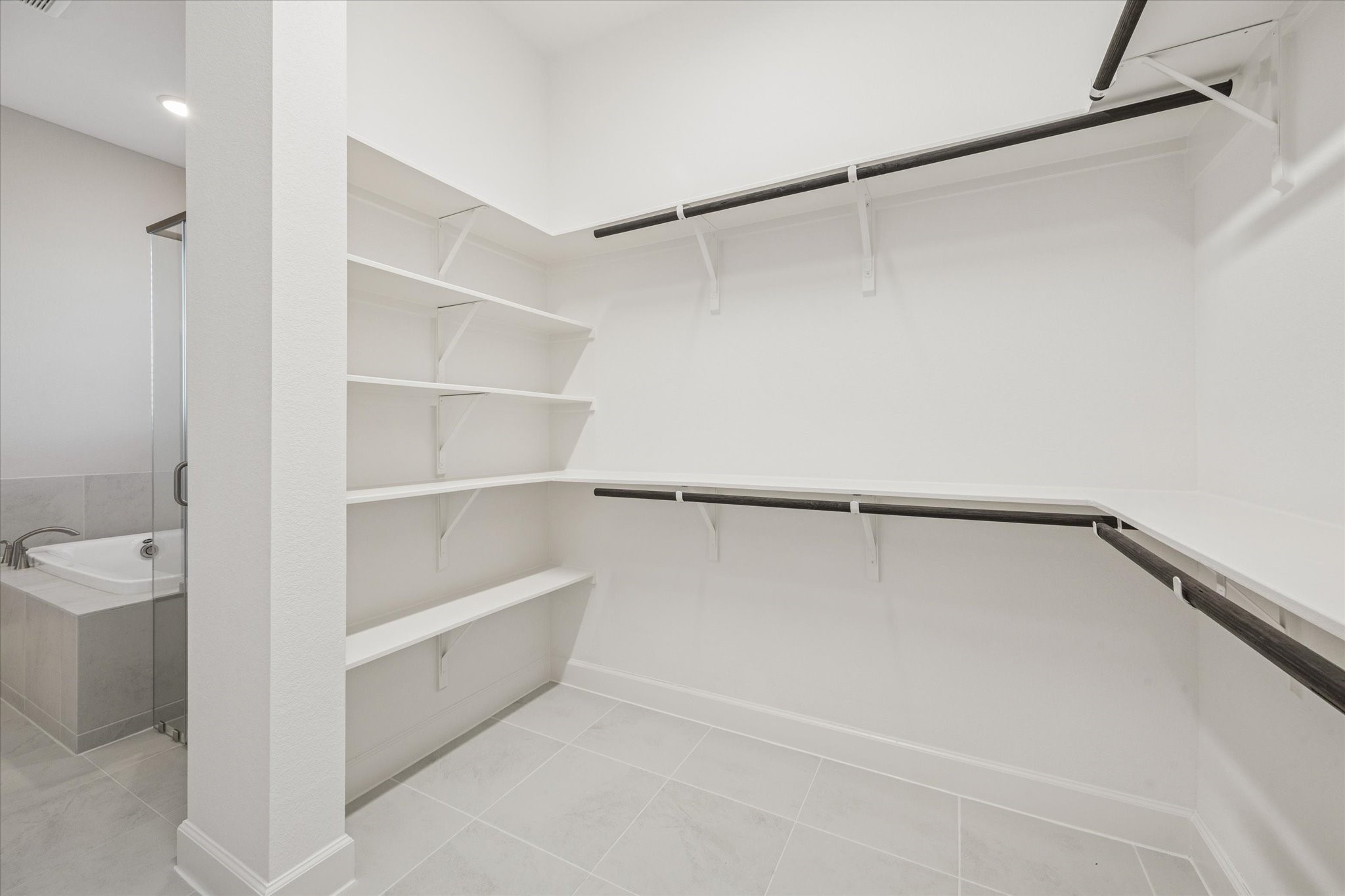 5518 Kindle Alley Manvel, TX 77578 - Photo 13 of 20 a view of an empty walk in closet