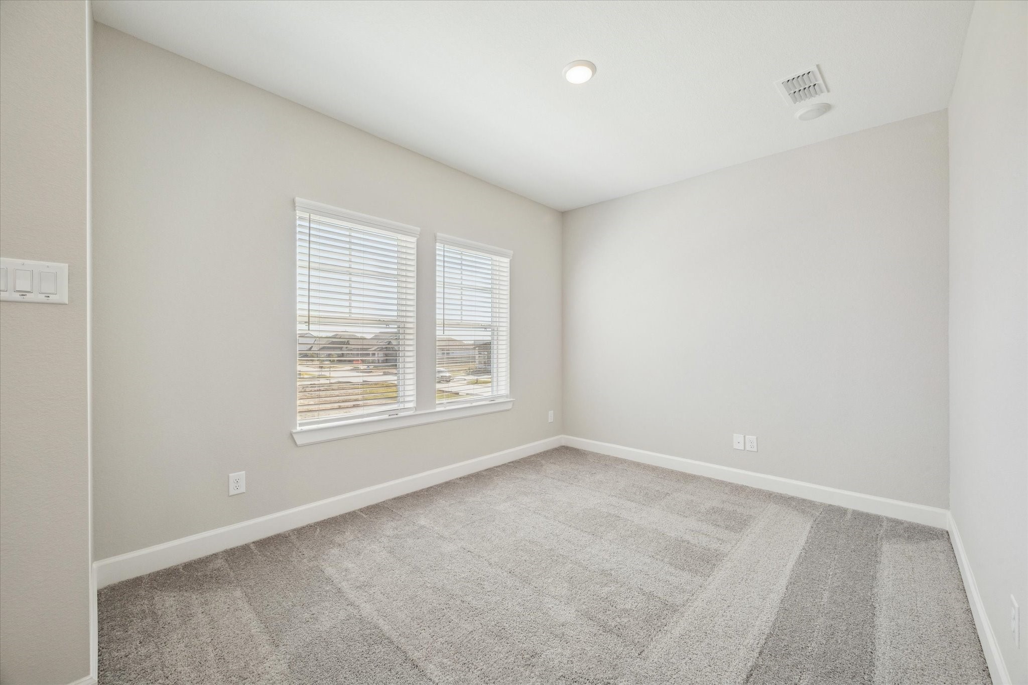 5518 Kindle Alley Manvel, TX 77578 - Photo 14 of 20 an empty room with a window