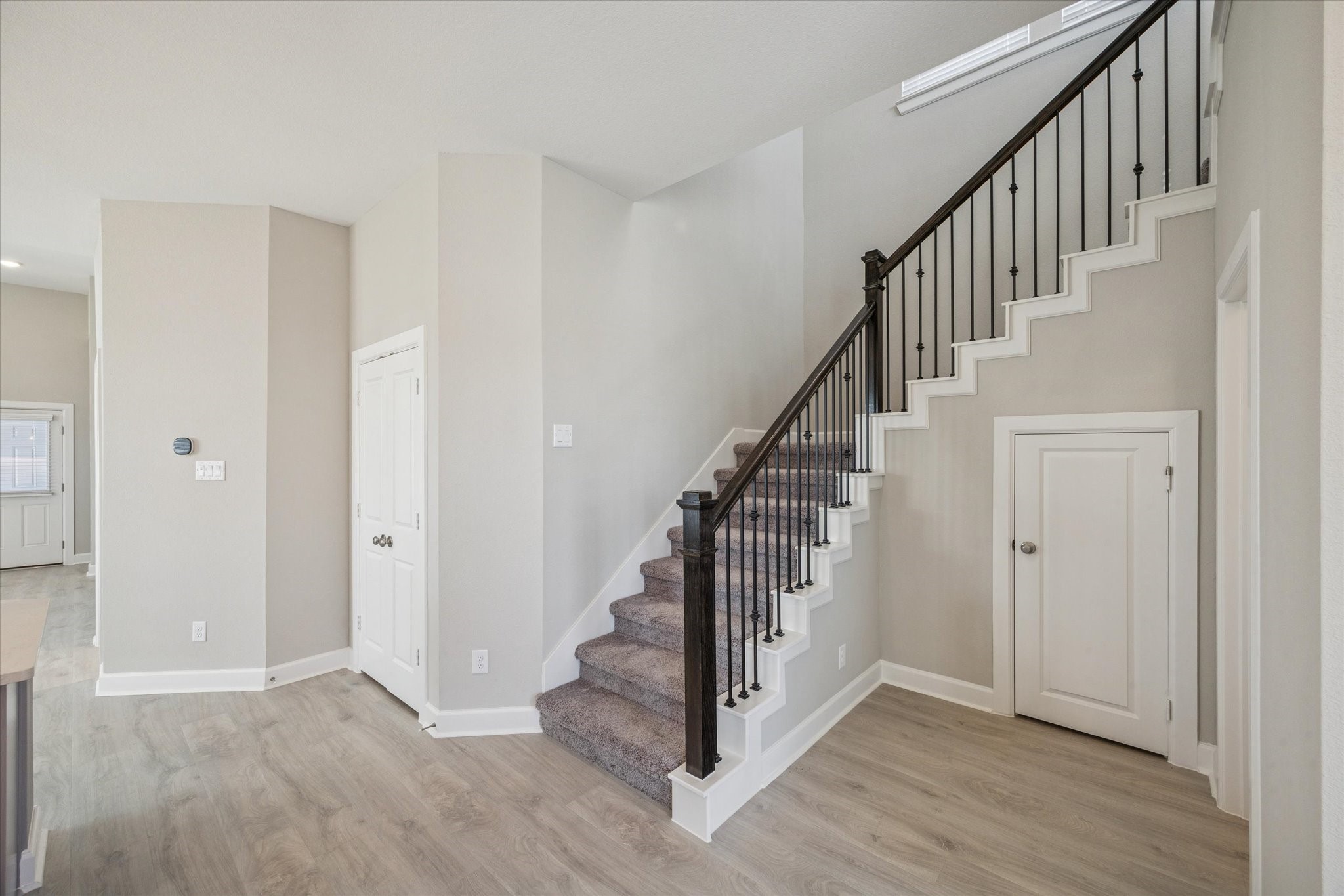 5518 Kindle Alley Manvel, TX 77578 - Photo 7 of 20 a view of an entryway with wooden floor