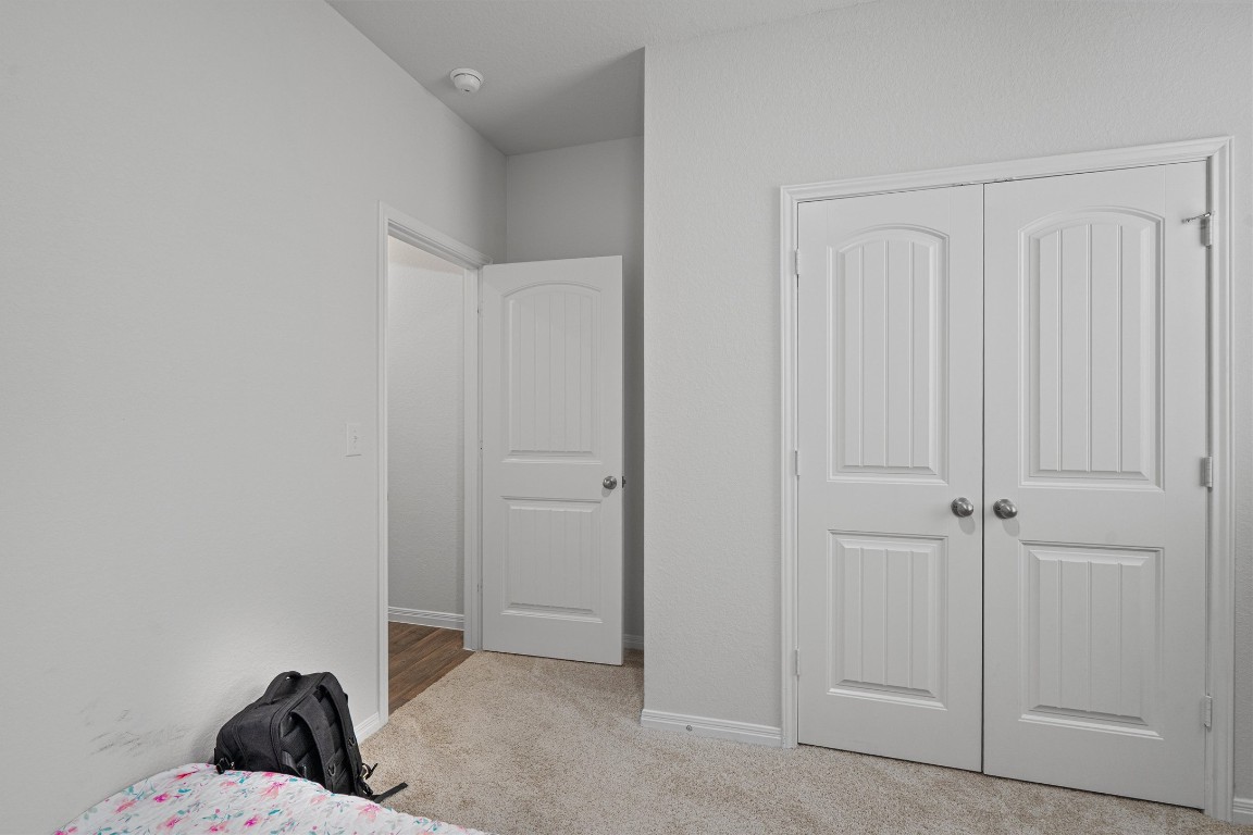 204 Connor Lane Georgetown, TX 78626 - Photo 25 of 31 a room with a bed