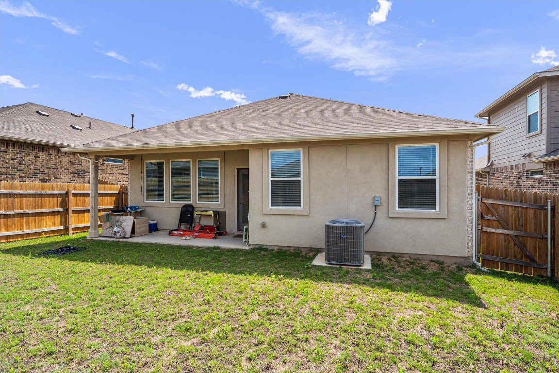 204 Connor Lane Georgetown, TX 78626 - Photo 30 of 31 a view of a house with backyard porch and furniture