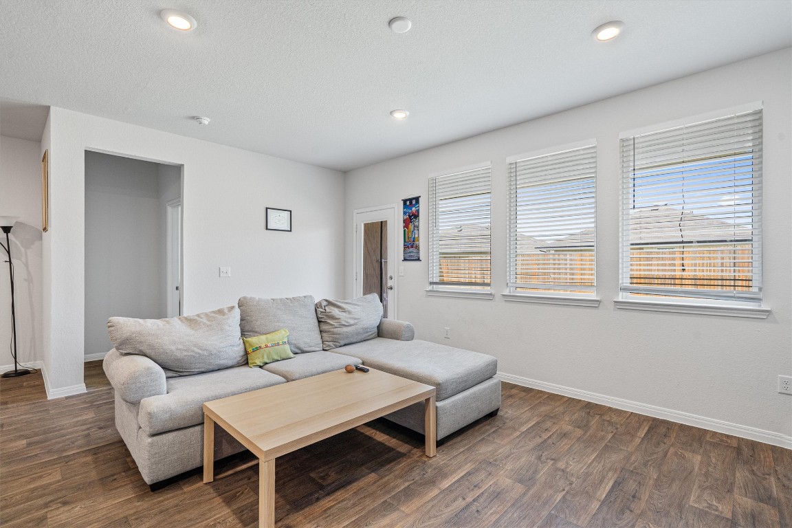 204 Connor Lane Georgetown, TX 78626 - Photo 8 of 31 a living room with furniture and a window