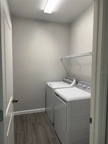 a utility room with dryer and washer